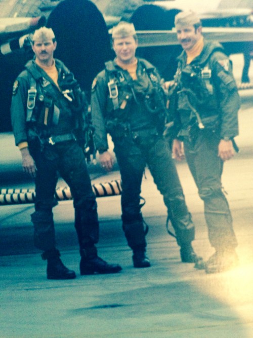 3 men in military uniform